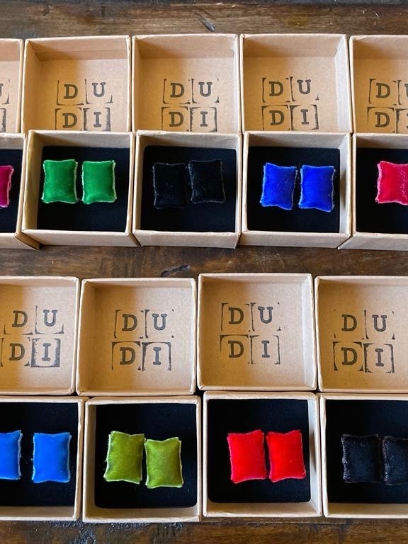 Scatoline DUDI aperte con Candy di colori diversi